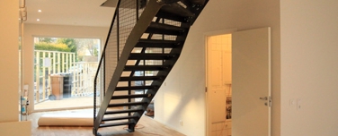 Stairs with metal "side cheeks"